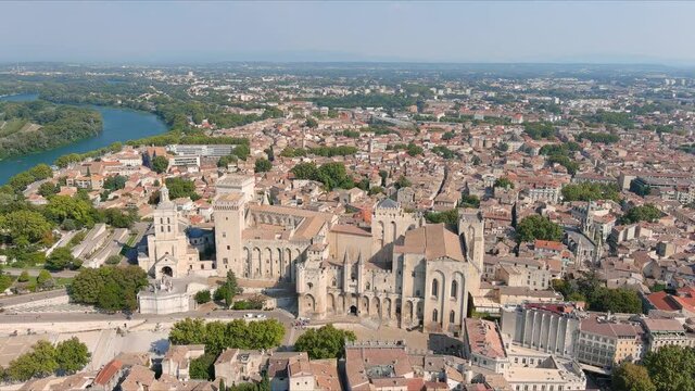 Avignon, France: Aerial view of Palais des Papes (Papal Palace), medieval fortress and former residence of popes in historic city center - landscape panorama of Europe from above