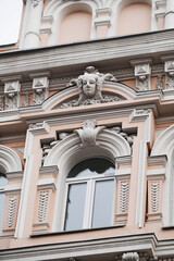 Building facade decor with human face