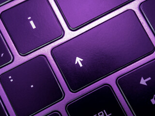 close up macro shift key with purple light