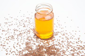 flaxseed and oil on a white background. vitamins and healthy food
