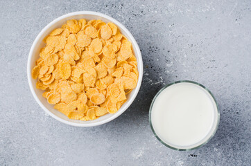 Corn flakes and milk. Healthy diet. Flat top view. Copy space