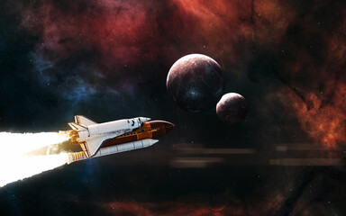 Space shuttle on background of planets in deep space. Science fiction. Elements of this image...