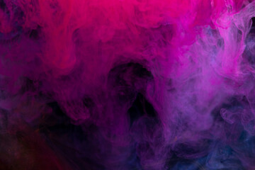 Abstract color paint splash isolated on black background
