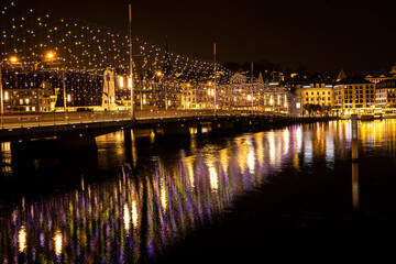 Fototapeta na wymiar Seebrücke in Luzern mit Weihnachtsbeleuchtung, Schweiz