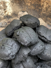 Fototapeta na wymiar Close up of coal briquettes in grill.