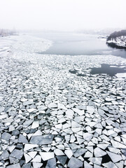 Drifting ice shards in Stockholm, Sweden. Foggy winter view. Winter in Stockholm. Winter in Sweden.