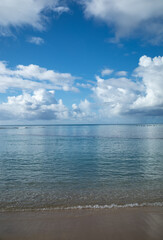 Waikiki Hawaii sand, sea, and clouds.