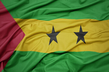 waving colorful national flag of sao tome and principe .