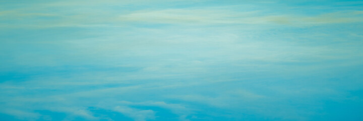 Beautiful twilight blue sunset sky in soft and smooth white clouds with blue sky background