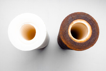 Water filter cartridge white new and used with rusty, reverse osmosis system