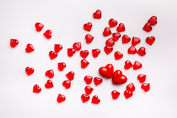 Red Heart shapes on abstract white background. Love concept for valentines day.