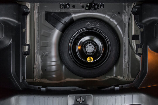 Dnipro, Ukraine - april 12, 2016: Nissan Juke 2014, spare wheel in the trunk, close up