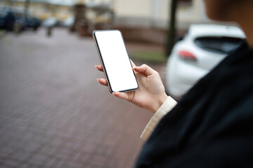 phone in the hands of a girl mockup