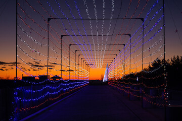 Tunnel of lights in a drive through holiday light display. Jones Beach New York. 