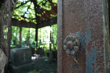 Fototapeta na wymiar Detail of an old gate in Lutheran cemetery