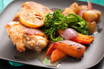 fried chicken thighs and vegetables