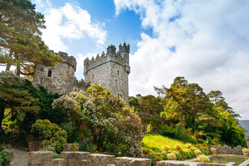 Fototapeta na wymiar Glenveagh Castle, Donegal in Northern Ireland. Beautiful park and garden in Glenveagh National Park, second largest park of the country. Gleann Bheatha in Irish language