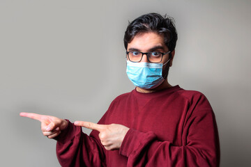 A mask wearing mask point towards a side