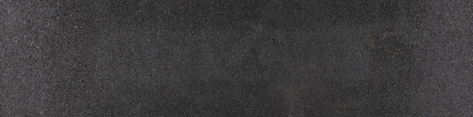 black grainy abstract background, texture and texture of black asphalt