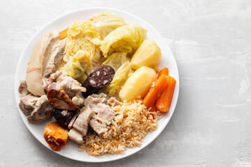 typical portuguese dish cozido a portuguesa on white dish