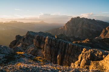 Beautiful scenic views of rocks and shadows at sunset in the Dolomites. Gorgeous stunning mountains in the golden hour. Italy