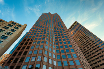Looking up at skyscrapers and skies.