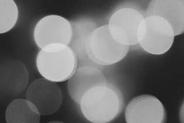 Black and white bokeh is used as a background in various festivals.