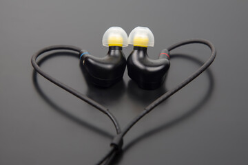 In-ear headphones for Hi-Fi music player. Audio sound and modern equipment for music lovers and...