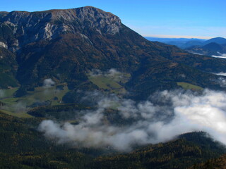 Clouds in the valley between Rax and Schneealpe in Lower Austria, Europe
