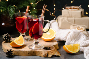 Mulled wine. Traditional christmas, new year and winter drink with red wine, citrus and spices.