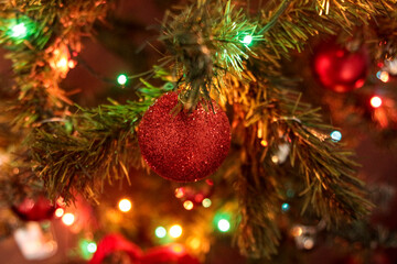 Christmas tree with face mask. Christmas decoration. Coronavirus pandemic Covit-19.