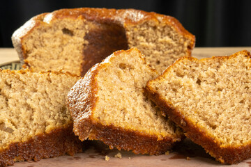 some slices of a banana cake on wooden table
