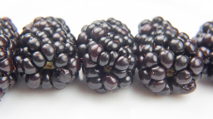 blackberries on white background. useful vitamin healthy food fruit. healthy vegetable breakfast