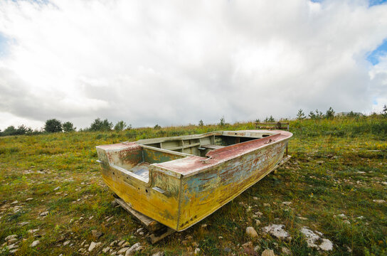 September, 2020 - Rakula. Empty village boats on the river bank. Crossing the river. Russia, Arkhangelsk region