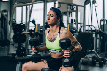 Fototapeta na wymiar young woman workout in gym