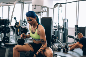 Fototapeta na wymiar young woman workout in gym