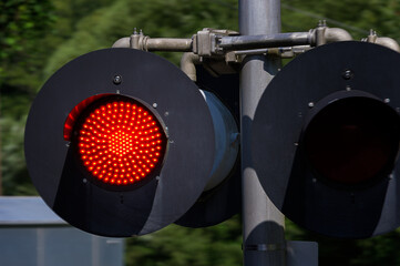 Close up of a railroad crossing light