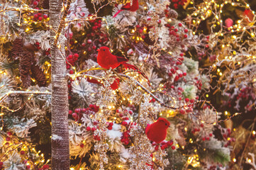 Christmas warm installations and decorations with garlands, trees, pine needles and illumination. 05 December 2020, Minsk, Belarus