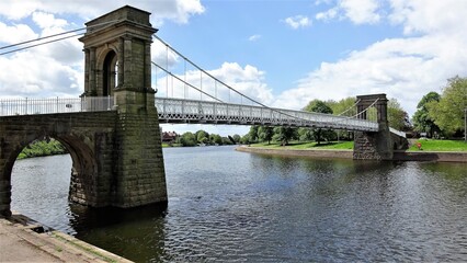 Obraz premium Nottingham Wilford Suspension Pedestrian walkway bridge over the River Trent. UK
