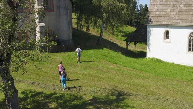 Trekkers tribe entering church of Lese Slovenia
