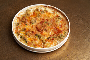 Frittata - Italian dish with baked broccoli, scrambled eggs