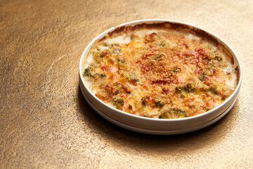 Frittata - Italian dish with baked broccoli, scrambled eggs