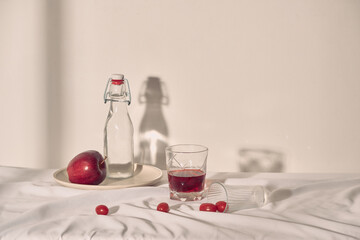 Apples, tomatoes with soda and glass of a cool sweet drink