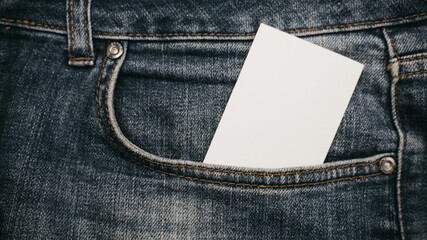 white paper in blue jeans Back pocket Business fashion Denim Hipster