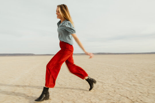 Woman in Red Pants