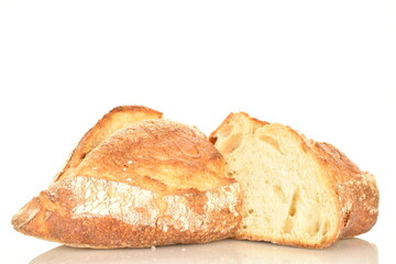 Fragrant French hearth bread, close-up, isolated on white.