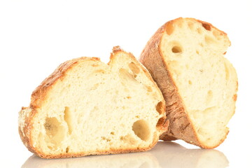 Fragrant French hearth bread, close-up, isolated on white.