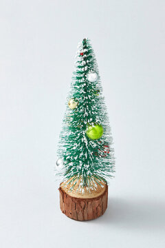 New Year Tree synthetic with balls decotation.