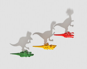Shadows from dinosaur toys.