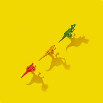 Hard shadows from dinosaur toys.